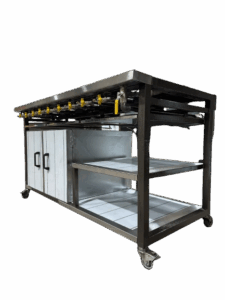 Commercial multi-burner gas cooker, side angle showing cabinet base, undershelf and castors