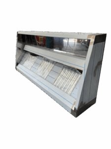 Wall-mounted extraction canopy showing stainless baffle filters