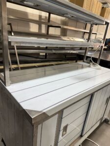 Mobile hot cupboard, top angle showing the worktop and gantry tiers
